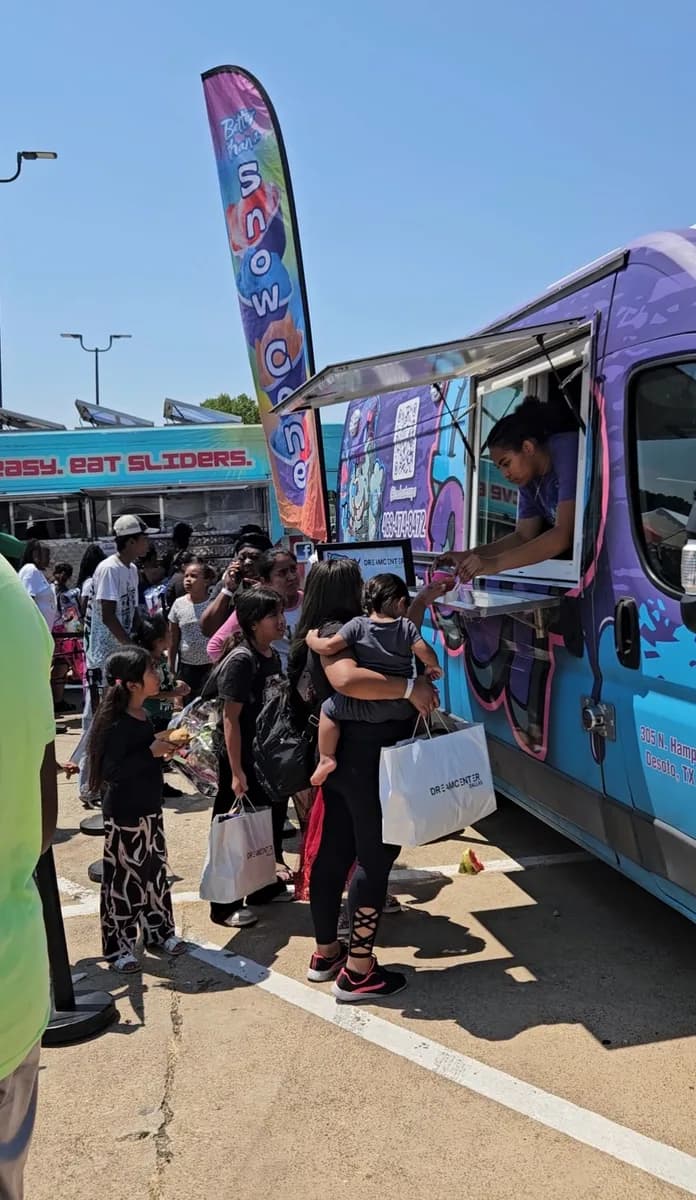 Families lined up at the Iced Out truck during a Dream Center Dallas community event